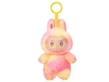 Monsters Labubu with bunny ears and a yellow handle on a white background