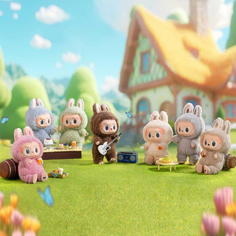 POP MART Labubu The Monsters in colorful costumes playing instruments in a cartoon-style landscape with a house in the background.