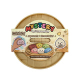 Glittery SQOOSH dumpling squishy toy filled with shimmering sparkles