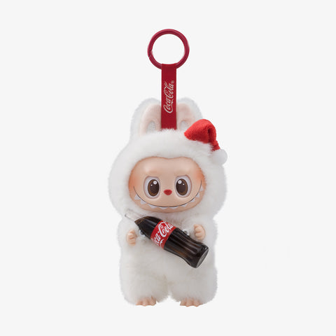 Pop Mart Labubu  character in a Santa outfit holding a Coca-Cola bottle with a red keychain on a white background.