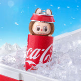 Pop Mart Labubu inside a Coca-Cola can on ice with a blue sky background