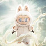 Pop Mart Labubu resembling a cute creature with large eyes and a soft texture, set against a light, blurred background.