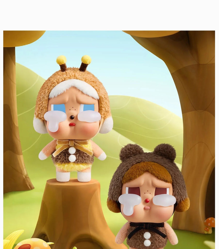 Two Pop Mart Labubu with animal-themed hats in a forest setting