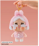 Pop Mart Labubu keychain with a cute design on a pink background