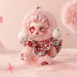 Pop Mart Labubu with pink hair and outfit on a soft pink background