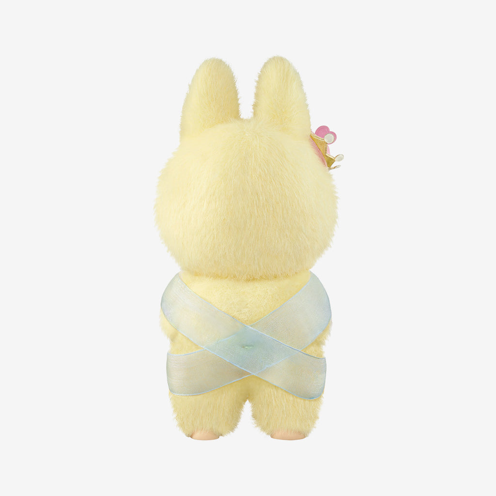 Yellow Monsters Labubu with a light blue ribbon on a white background