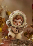 Small POP MART’s Skullpanda in a winter outfit with a detachable hood, standing on a wooden surface with a blurred natural background.
