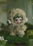 POP MART’s Skullpanda in a fluffy costume sitting on a green surface with a blurred background