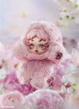 Cute POP MART’s Skullpanda with pink hair and outfit surrounded by pink flowers