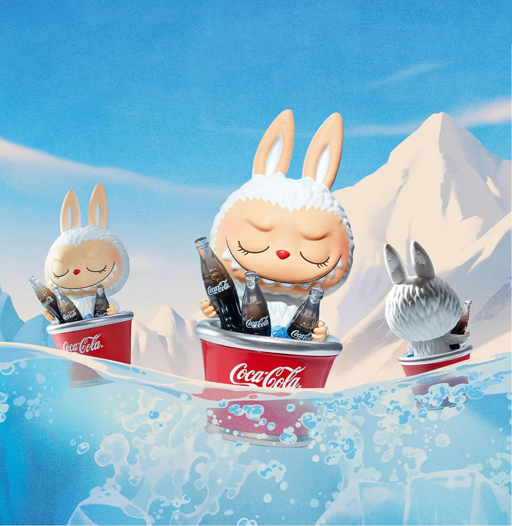 POP MART Labubu Coca cola Series with Coca-Cola bottles in a cooler against a mountainous background