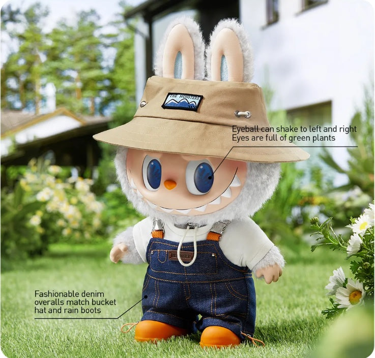 POP MART Labubu with bunny ears and a bucket hat in a garden setting
