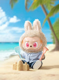 POP MART Labubu Flip with me of a character with bunny ears building sandcastles on a beach