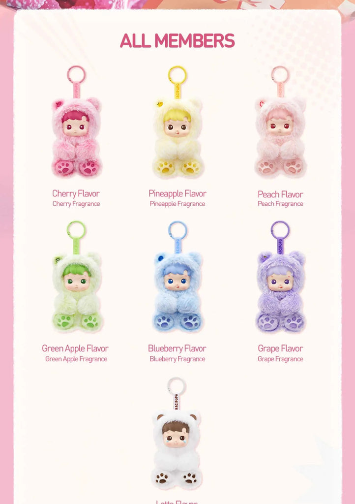 Set of colorful POPMART HACIPUPU Gummy Bear Series keychains with different fragrances on a pink background