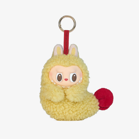 POPMART the MONSTERS Wacky Mart Series Earphone keychain with a cartoon face and red ball on a white background