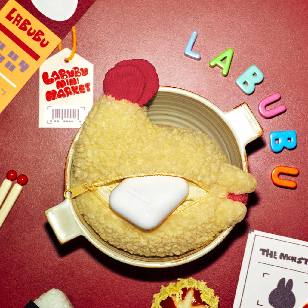Labubu product with colorful letters and branding on a red background
