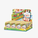 Display box of 'The Monster Wacky Mart' toy figures with colorful packaging.