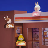 Toy store display with Pop Mart the Labubu Monsters and signage against a blue background