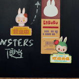 Pop Mart the Labubu Monsters with signs and text on a black background