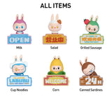 Set of Pop Mart the Labubu Monsters with signs indicating different food items on a white background.