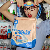 Person holding a 'LABUBU' product with a colorful background
