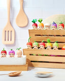 Colorful Sonny Angel Hipper Harvest Series on a wooden shelf with kitchen utensils.