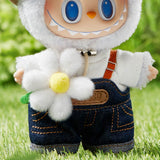 Pop Mart the Labubu Monsters with a white outfit, blue jeans, and a flower on a grassy background
