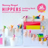 Decorative mini figures from the Sonny Angel Hippers series on a white background with stationery items.