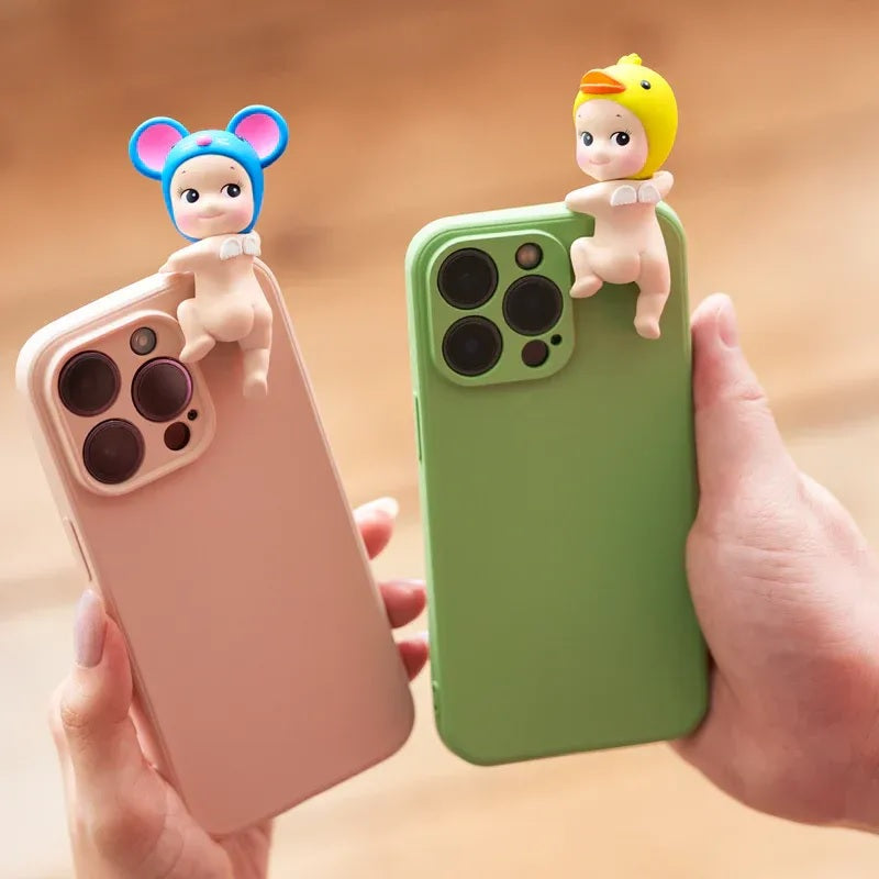 Two phone cases with Sonny Angels Looking Back on a beige background