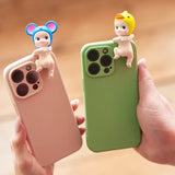 Two phone cases with Sonny Angels Looking Back on a beige background