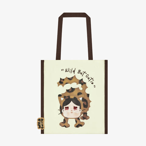 POP MART Wild but Cutie Bag with cartoon character and text 'Wild But Outie' on a beige background