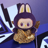POP MART Labubu Wings of fortune with purple hood and gold outfit on a blue and white background