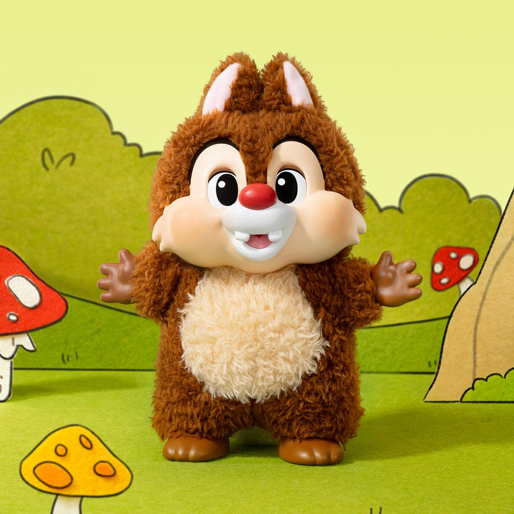 Plush toy of a cartoon chipmunk character with a forest background
