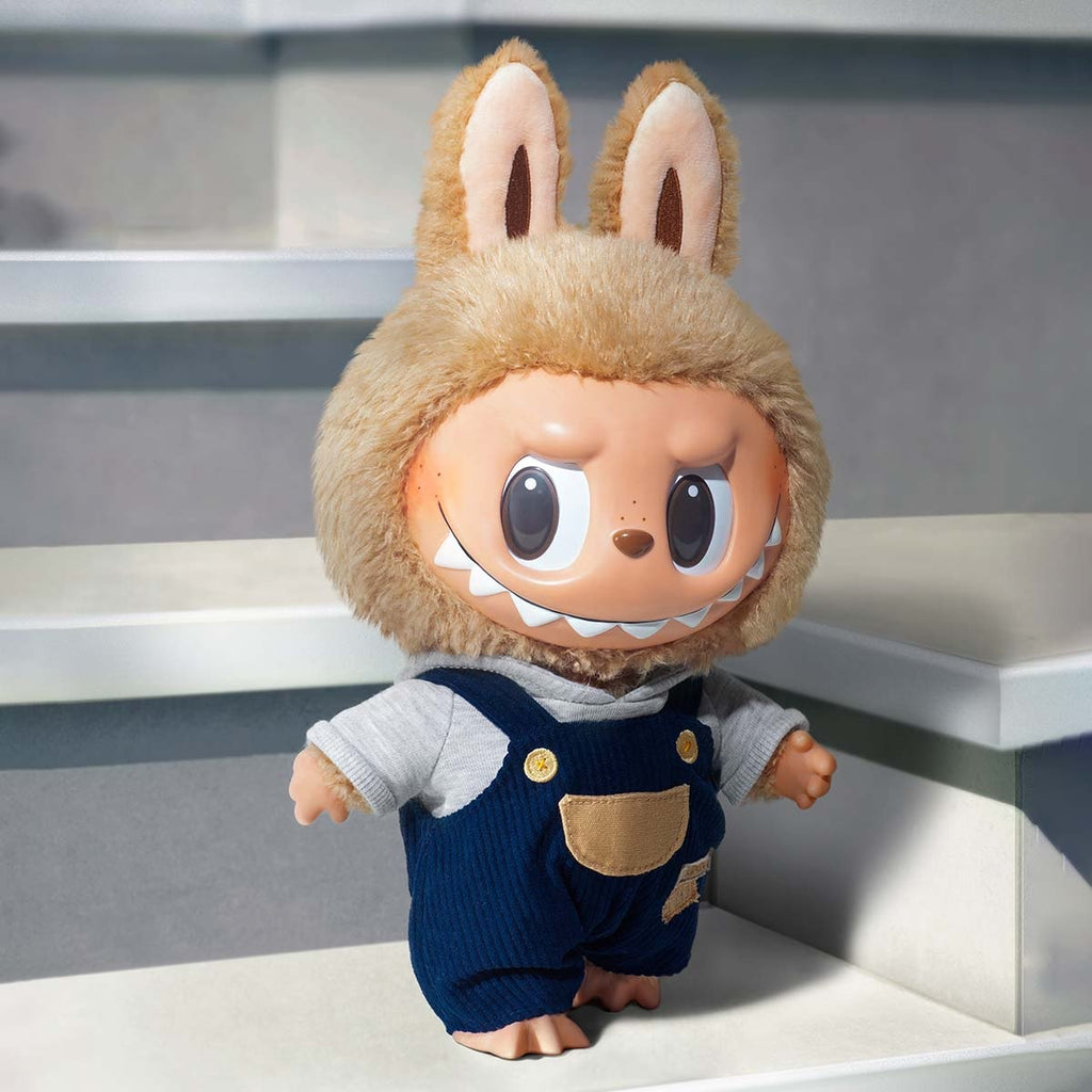 POP MART Time to chill with bunny ears and a blue outfit on a neutral background