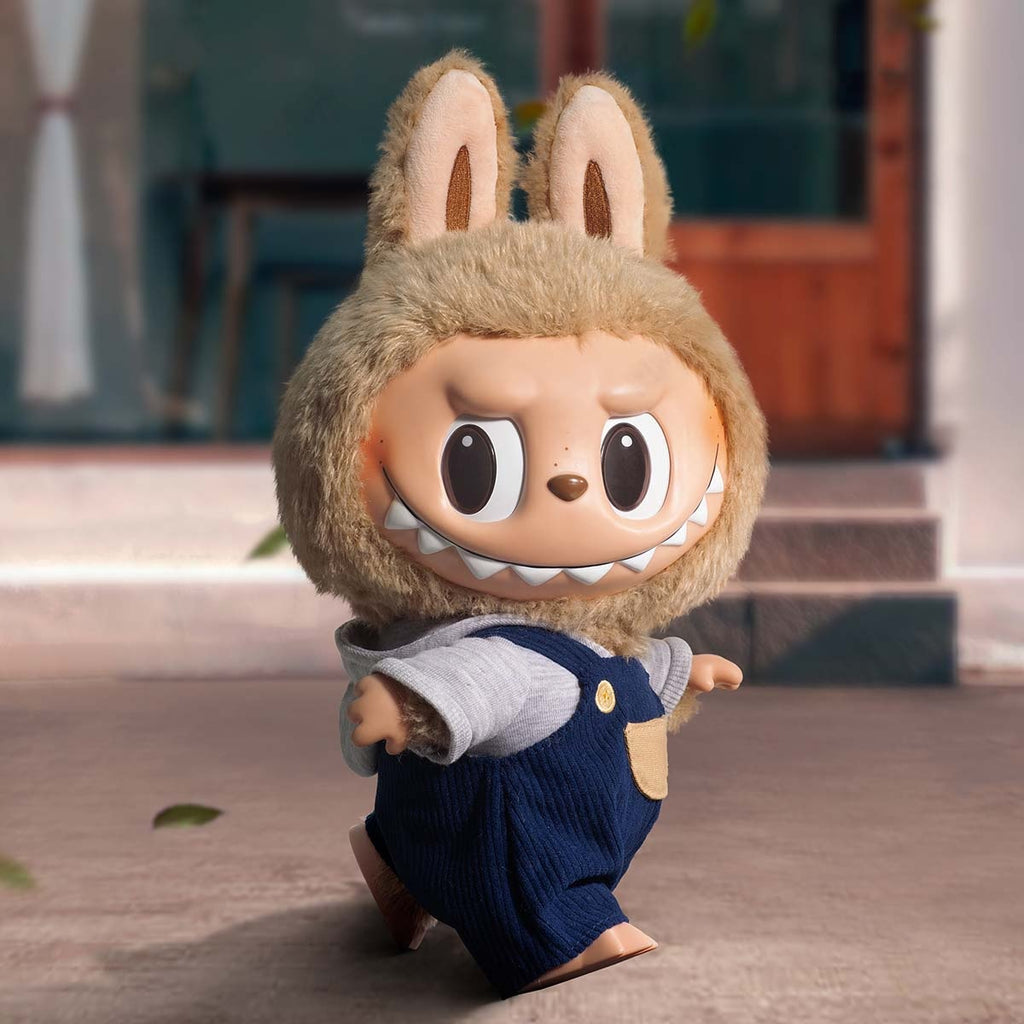 POP MART Time to chill with animal-like design wearing a blue outfit outdoors