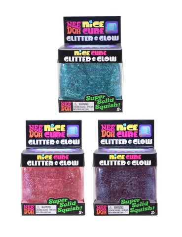 NeeDoh Nice Cube Glitter and Glow toy glowing softly in dark with embedded glitter